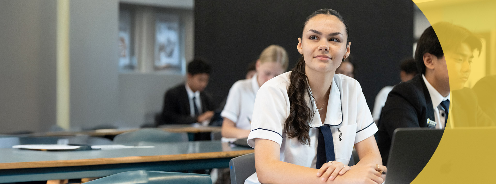 Student sitting at her desk in the classroom at St Agnes Catholic High School Rooty Hill