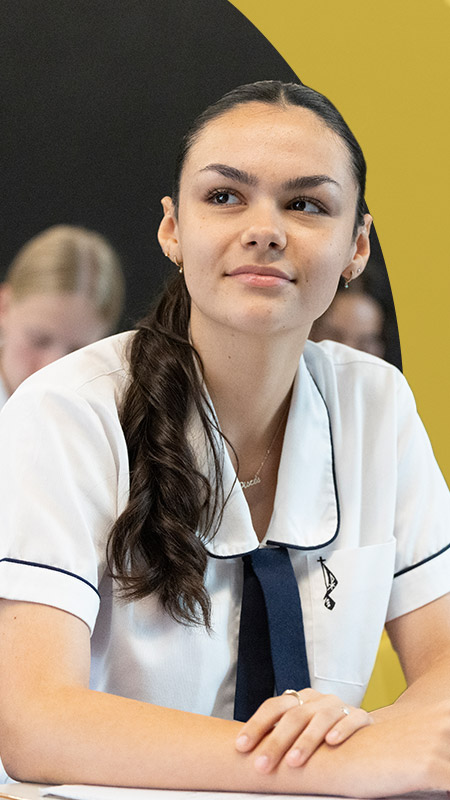 Student sitting at her desk in the classroom at St Agnes Catholic High School Rooty Hill