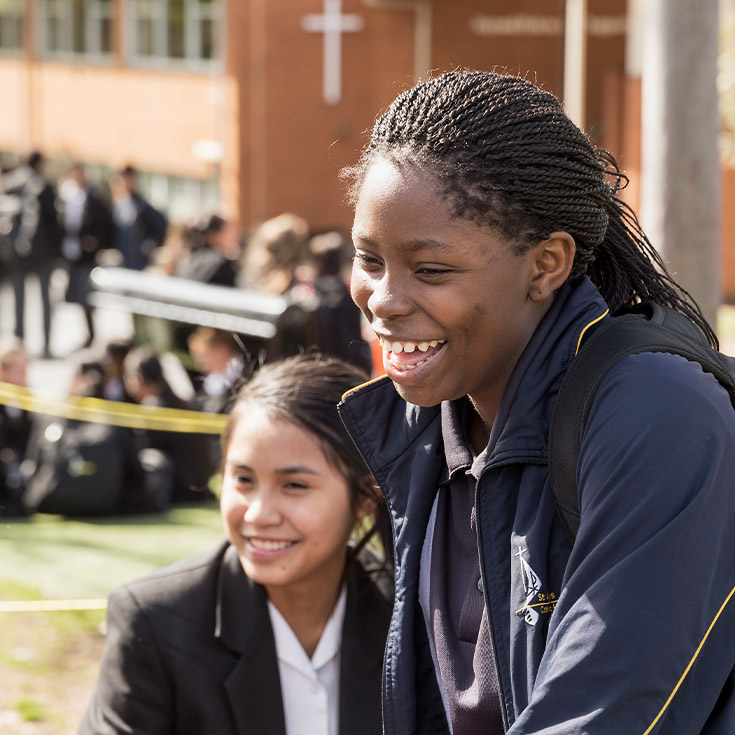 Students playing outside in their lunch break at St Agnes Catholic High School Rooty Hill