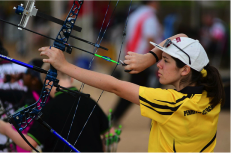 St Agnes Rooty Hill student shooting bow and arrow