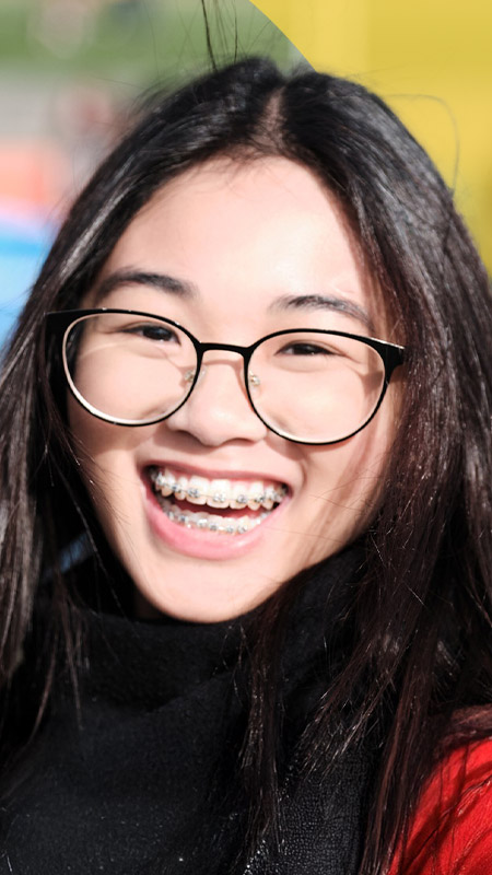 Student smiling at the school swimming carnival at St Agnes Catholic High School Rooty Hill