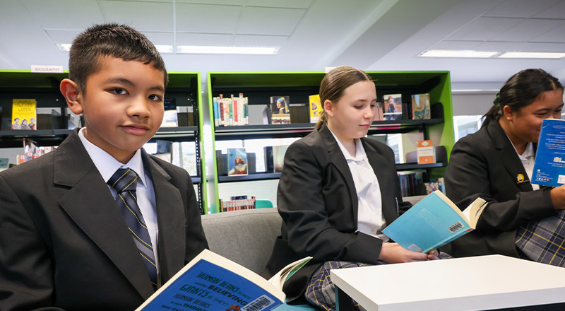 Students reading together in the library at St Agnes Catholic High School Rooty Hill