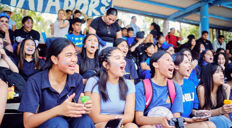Students cheering for their house team at St Agnes Catholic High School Rooty Hill