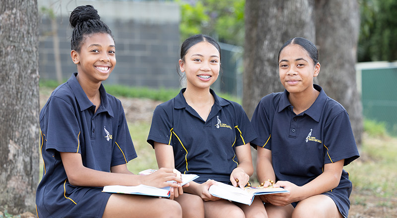 Students sitting together outside at St Agnes Catholic High School Rooty Hill
