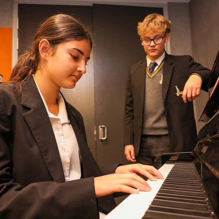 Students playing the piano at St Agnes Catholic High School Rooty Hill