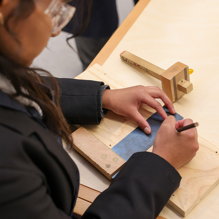 Student working on a project in the classroom at St Agnes Catholic High School Rooty Hill