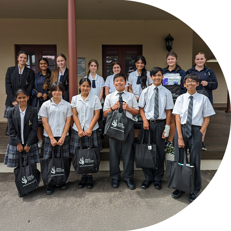 Students standing with their donated items at St Agnes Catholic High School Rooty Hill